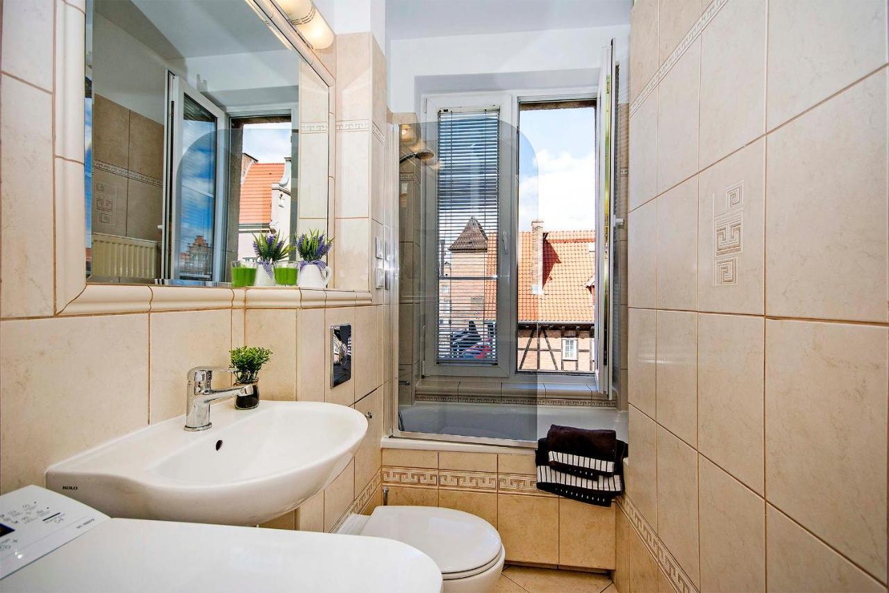 Central Apartments Ogarna Gdansk Bagian luar foto